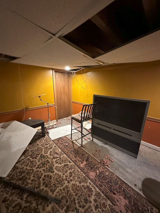bedroom with a paneled ceiling