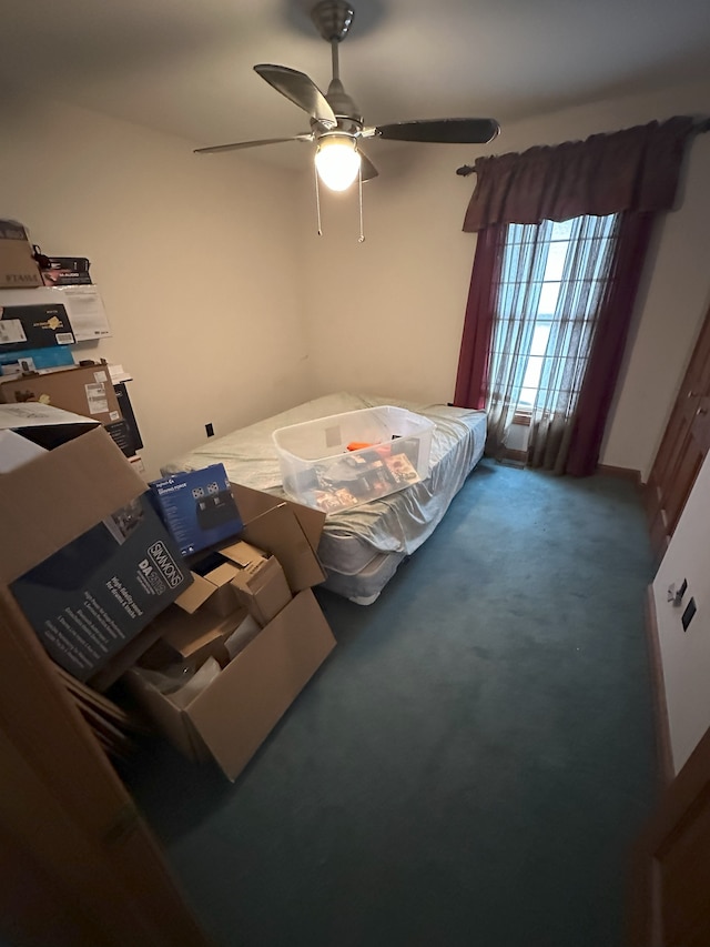 carpeted bedroom featuring ceiling fan