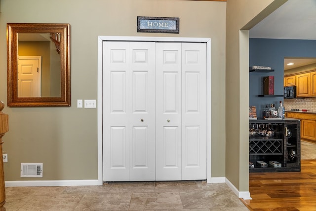interior space featuring visible vents and baseboards