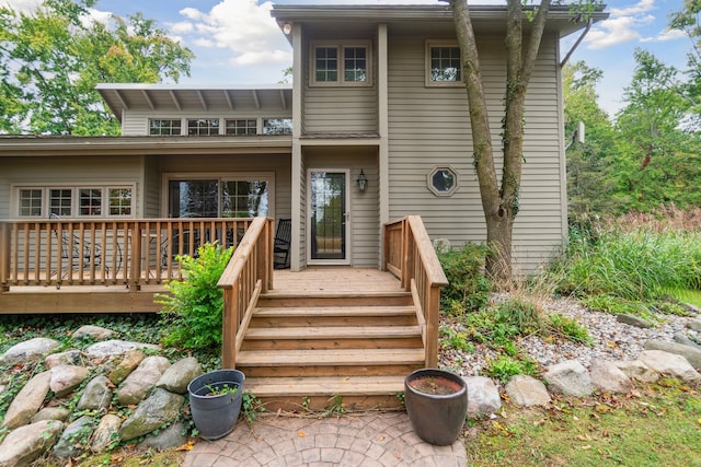 9247 Schrepfer Rd, Howell, MI 48855 - rear view of property featuring a wooden deck