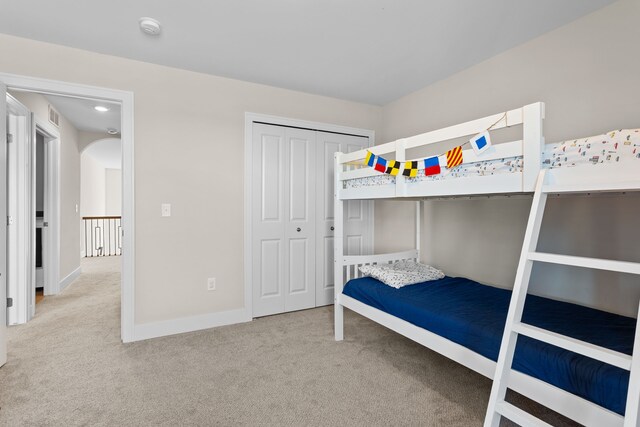 bedroom featuring visible vents, carpet floors, and baseboards