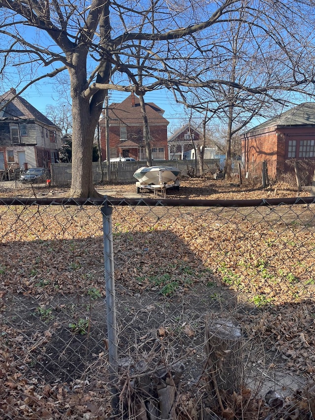 628 Taylor St, Detroit, MI 48202 - view of yard featuring fence