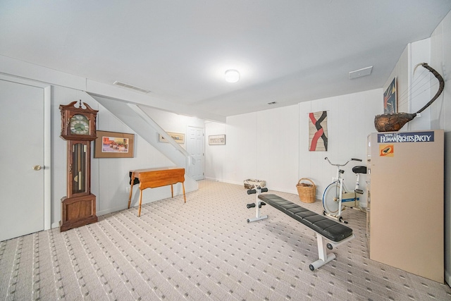 workout room with carpet and visible vents