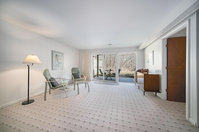sitting room with light carpet and plenty of natural light