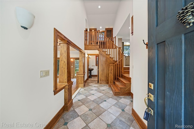 28190 Wildwood Trl, Farmington Hills, MI 48336 - foyer featuring stairway, light tile patterned flooring, recessed lighting, and a towering ceiling