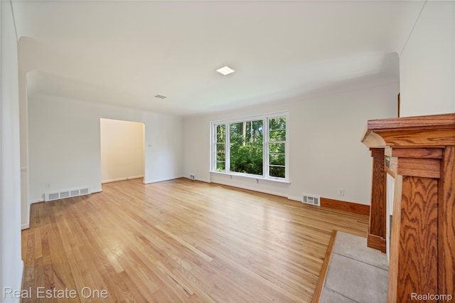 28190 Wildwood Trl, Farmington Hills, MI 48336 - unfurnished living room featuring light wood-style floors and baseboards