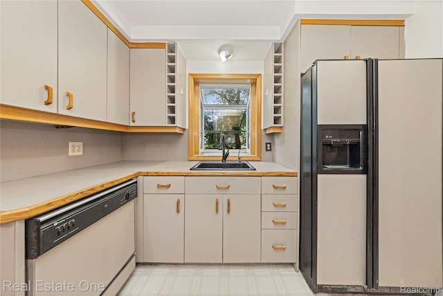 28190 Wildwood Trl, Farmington Hills, MI 48336 - kitchen with refrigerator with ice dispenser, dishwasher, and light countertops
