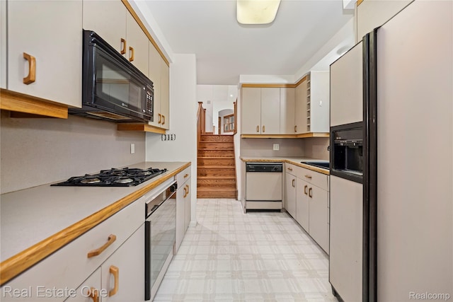 28190 Wildwood Trl, Farmington Hills, MI 48336 - kitchen with white appliances, light flooring, and light countertops