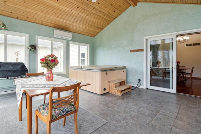 sunroom with visible vents, vaulted ceiling with beams, a wall unit AC, wooden ceiling, and an inviting chandelier