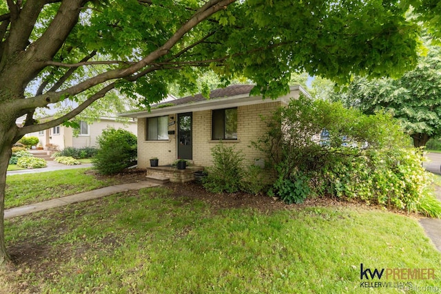 22180 Boulder Ave, Eastpointe, MI 48021 - single story home featuring brick siding and a front lawn