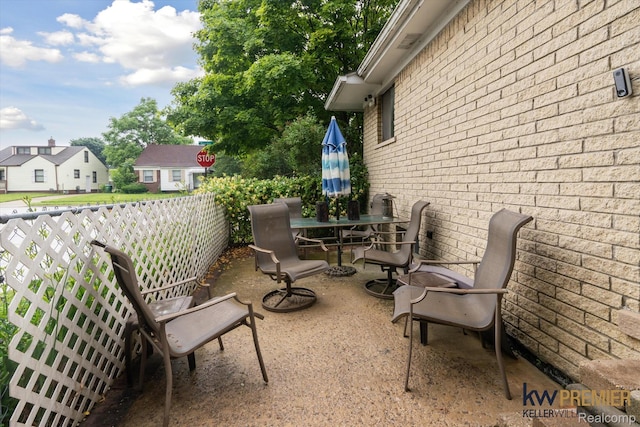 22180 Boulder Ave, Eastpointe, MI 48021 - view of patio / terrace with outdoor dining space and a residential view