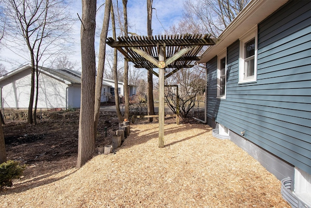 view of yard with a pergola