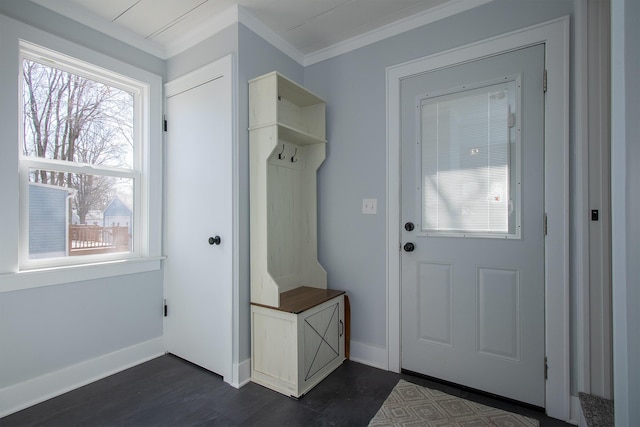 mudroom with dark wood-style floors, crown molding, and baseboards