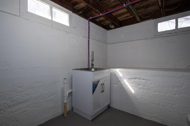 basement featuring a sink