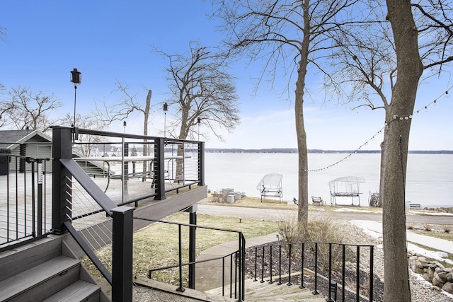 exterior space with a water view