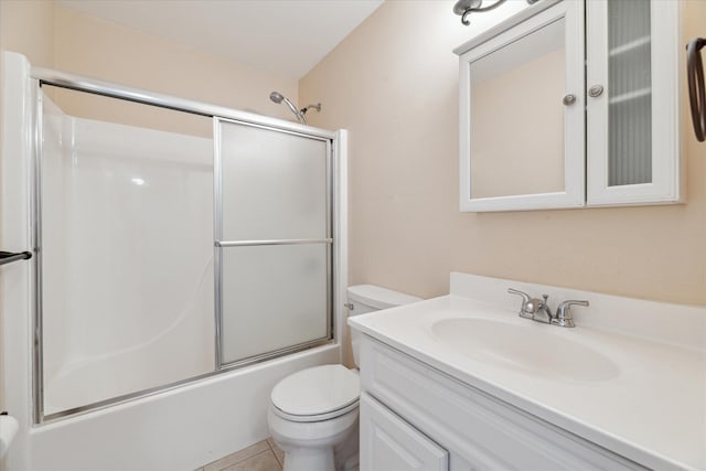 713 Mary Ann Dr, Holly, MI 48442 - bathroom with vanity, bath / shower combo with glass door, and toilet