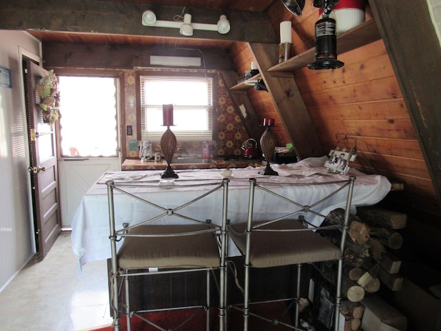 5892 Woodland Dr, Lake, MI 48632 - interior space featuring wood walls and open shelves