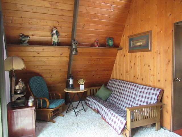 5892 Woodland Dr, Lake, MI 48632 - sitting room with vaulted ceiling, wooden walls, and carpet