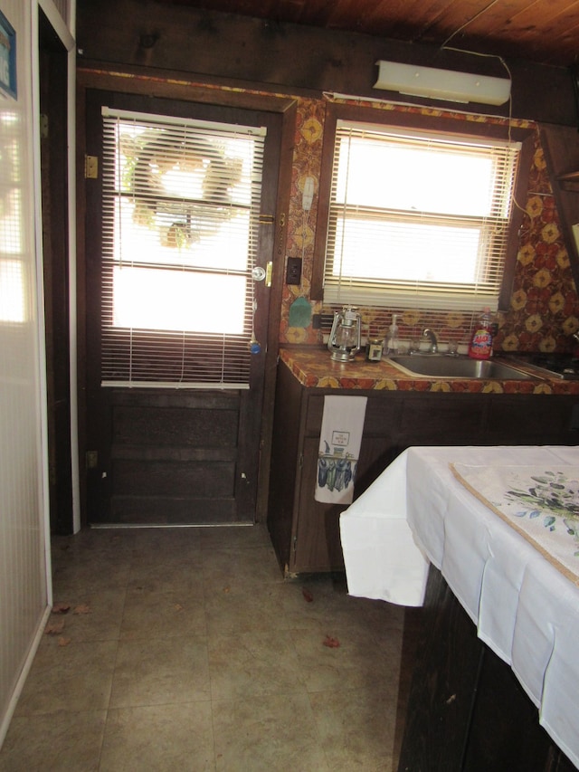 5892 Woodland Dr, Lake, MI 48632 - kitchen featuring plenty of natural light, butcher block countertops, and a sink