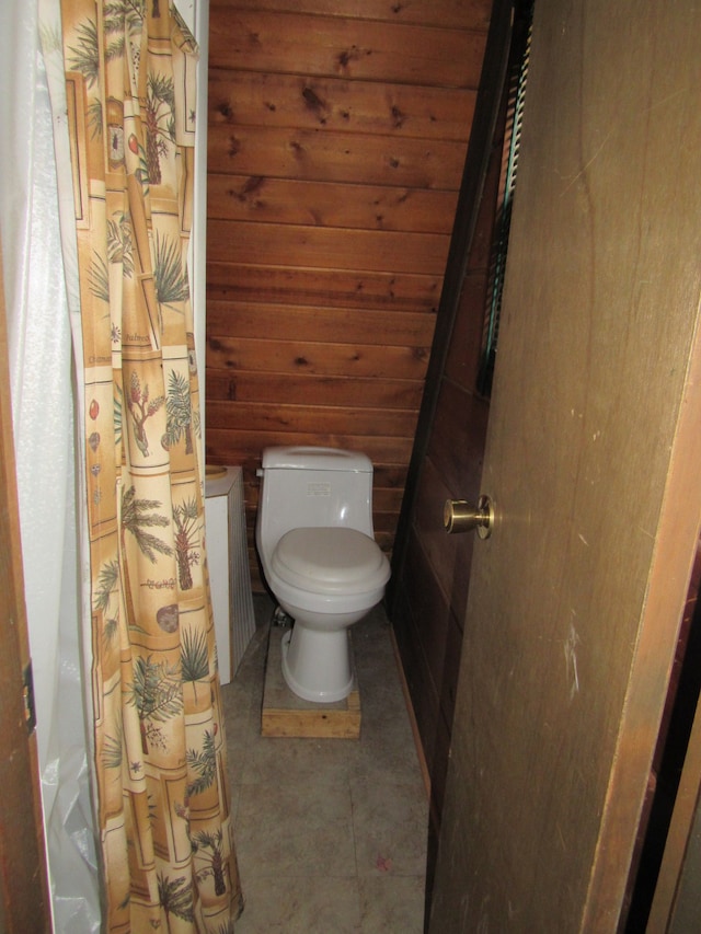 5892 Woodland Dr, Lake, MI 48632 - bathroom with toilet and wood walls