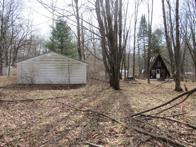5892 Woodland Dr, Lake, MI 48632 - view of yard with an outbuilding