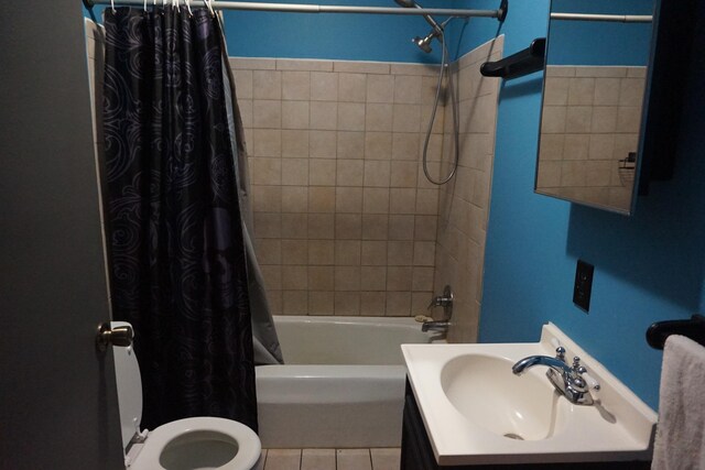 1758 Manor Rd, Au Gres, MI 48703 - full bathroom with tile patterned floors, shower / bath combination with curtain, toilet, and vanity