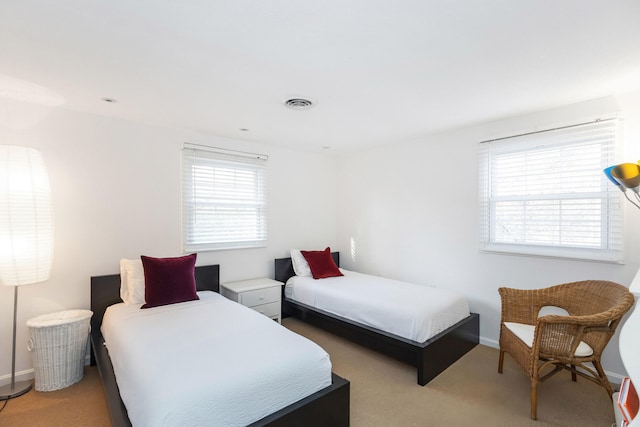 9696 Union Pier Rd, Union Pier, MI 49129 - bedroom featuring visible vents, multiple windows, and baseboards