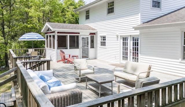9696 Union Pier Rd, Union Pier, MI 49129 - deck with french doors, outdoor dining area, and an outdoor hangout area