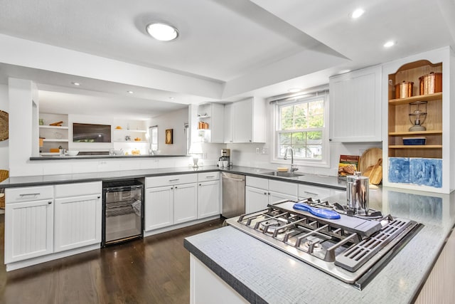 9696 Union Pier Rd, Union Pier, MI 49129 - kitchen featuring open shelves, a sink, stainless steel appliances, white cabinetry, and dark wood-style floors