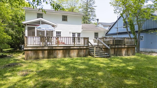 9696 Union Pier Rd, Union Pier, MI 49129 - rear view of property with a wooden deck, a yard, a sunroom, and a shingled roof