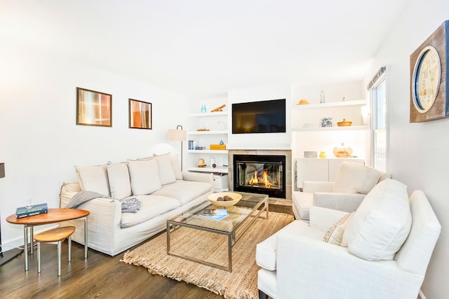 9696 Union Pier Rd, Union Pier, MI 49129 - living room featuring wood finished floors and a tile fireplace