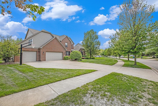 6317 Wilson Rd, Ann Arbor, MI 48108 - view of home's exterior with brick siding, driveway, a yard, and a garage