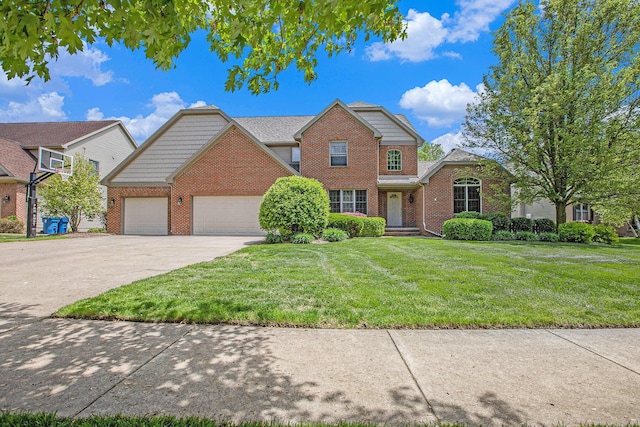 6317 Wilson Rd, Ann Arbor, MI 48108 - traditional-style home featuring brick siding, a garage, driveway, and a front lawn
