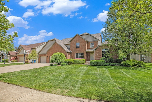 6317 Wilson Rd, Ann Arbor, MI 48108 - view of front facade featuring brick siding, concrete driveway, a front yard, and a garage