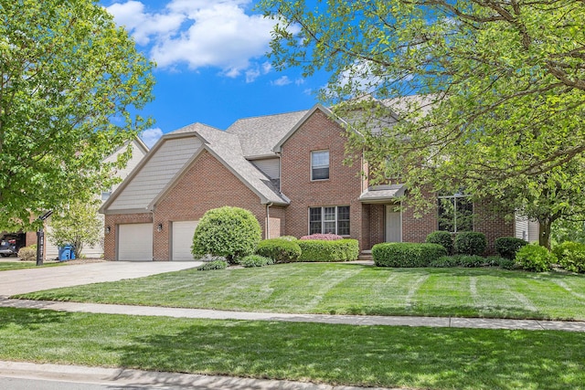 6317 Wilson Rd, Ann Arbor, MI 48108 - traditional-style home with brick siding, driveway, a garage, and a front lawn