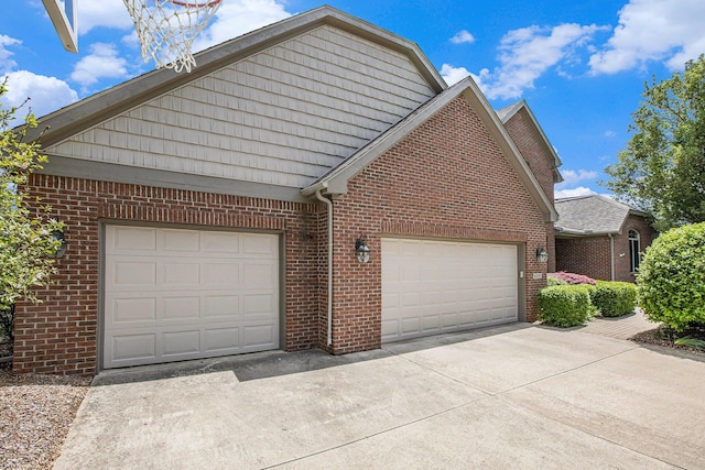 6317 Wilson Rd, Ann Arbor, MI 48108 - garage with concrete driveway