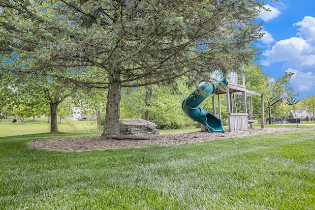 6317 Wilson Rd, Ann Arbor, MI 48108 - view of grassy yard featuring a playground
