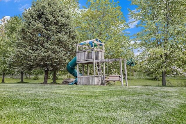 6317 Wilson Rd, Ann Arbor, MI 48108 - view of grassy yard with a playground