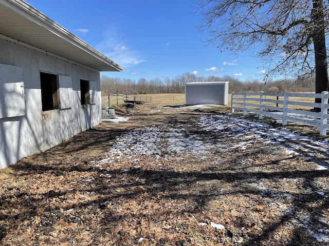 70255 51st St, Lawrence, MI 49064 - view of yard with fence, an outbuilding, and a rural view