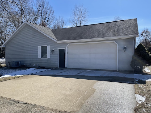 70255 51st St, Lawrence, MI 49064 - ranch-style house featuring roof with shingles, central air condition unit, and a garage