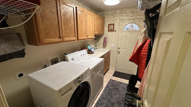 70255 51st St, Lawrence, MI 49064 - laundry room with light tile patterned floors, independent washer and dryer, and cabinet space