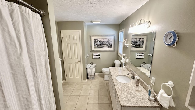 70255 51st St, Lawrence, MI 49064 - full bathroom featuring a textured ceiling, tile patterned flooring, vanity, baseboards, and toilet