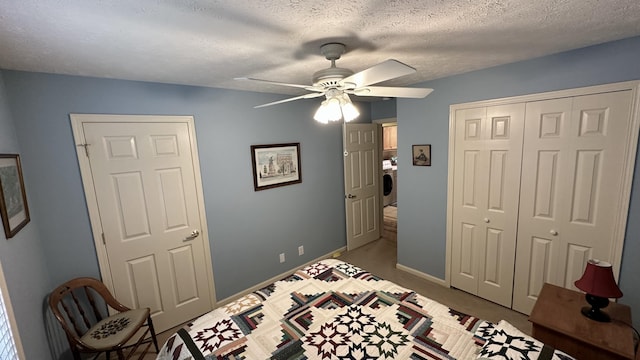 70255 51st St, Lawrence, MI 49064 - bedroom with a textured ceiling, washer / clothes dryer, a ceiling fan, baseboards, and a closet