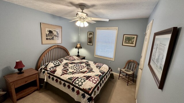 70255 51st St, Lawrence, MI 49064 - bedroom with a ceiling fan, a textured ceiling, light colored carpet, and baseboards