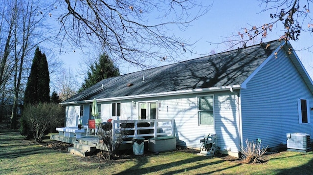 70255 51st St, Lawrence, MI 49064 - rear view of property with a lawn, roof with shingles, central AC unit, and a deck