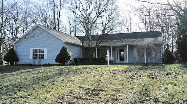 70255 51st St, Lawrence, MI 49064 - view of front of house featuring a porch and a front lawn