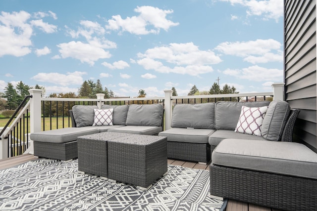 wooden deck with outdoor lounge area