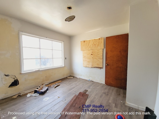 15876 Burt Rd, Detroit, MI 48223 - unfurnished room with hardwood / wood-style floors