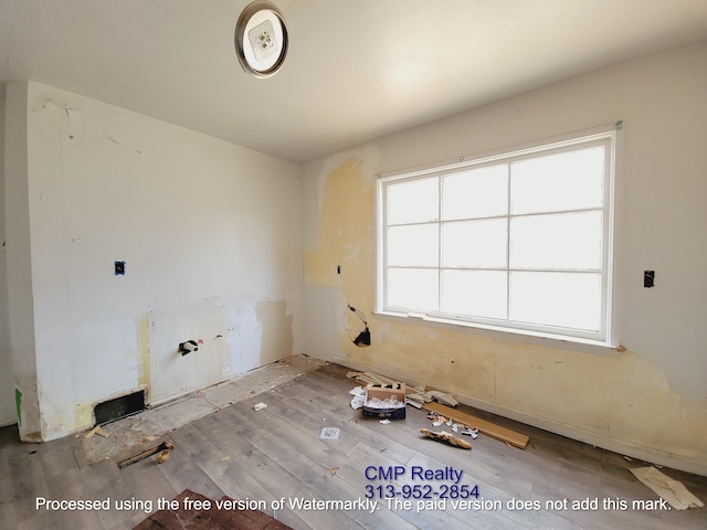 15876 Burt Rd, Detroit, MI 48223 - empty room with wood finished floors