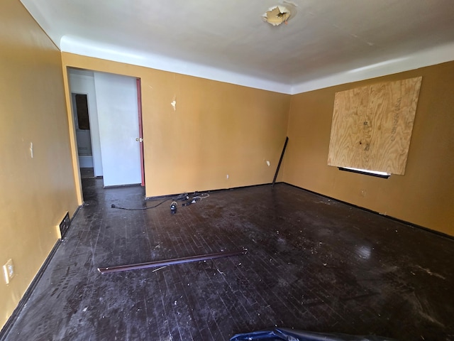 15876 Burt Rd, Detroit, MI 48223 - spare room with hardwood / wood-style floors